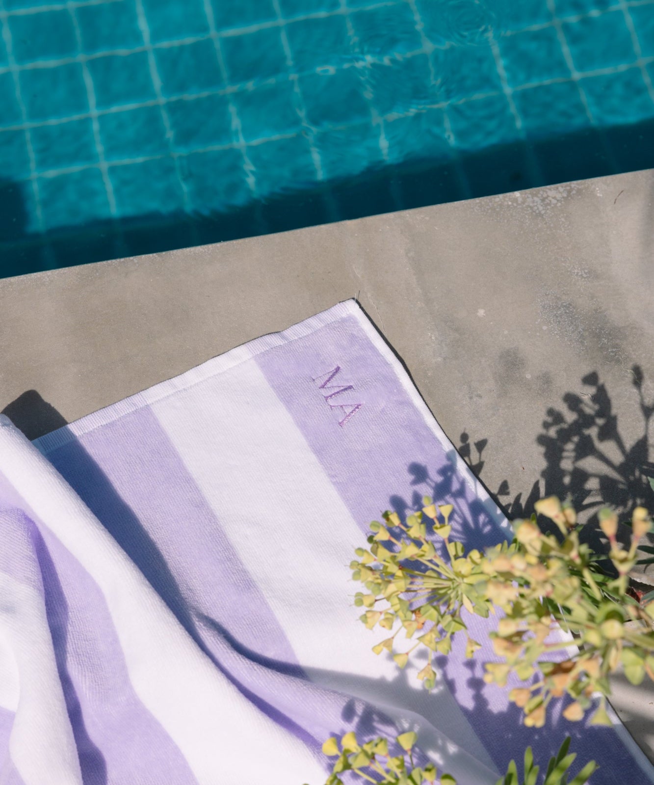 torres-novas-gibalta-beach-towels-vertical-stripes-product-embroidery-lavender-1_338468b2-9934-4ec6-916e-e5d65979d6ec.jpg
